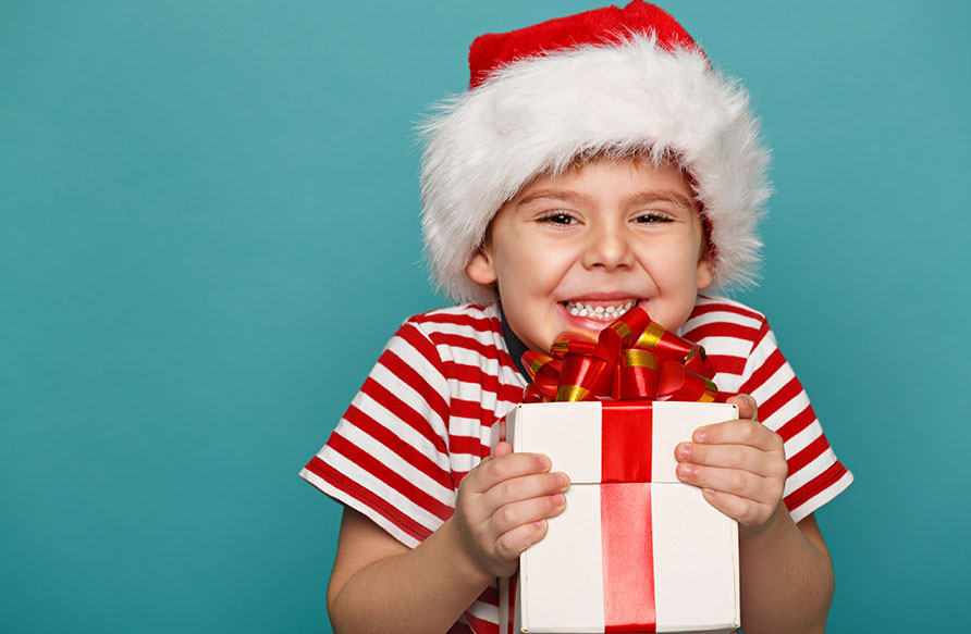 Holiday Gift Giving for Your Child’s Best Smile